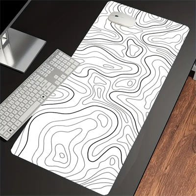 espace travail noir avec sous main bureau motif noir fond blanc