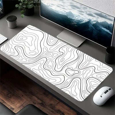 Sous main bureau avec motif courbes dans espace travail organisé 